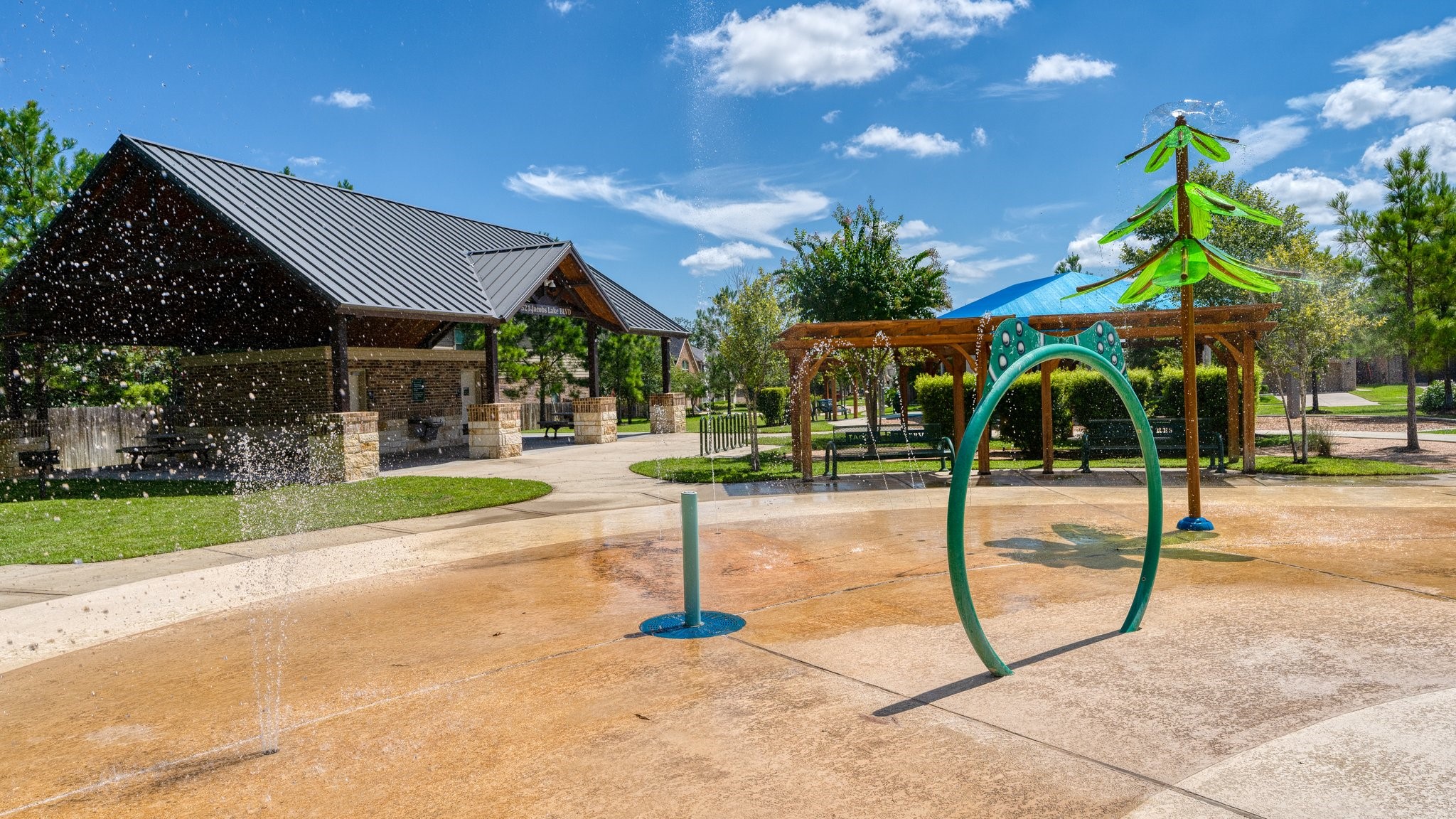 307 Arbor Ridge Lane Conroe, TX 77384 - Photo 45 of 50 a view of a park with swings