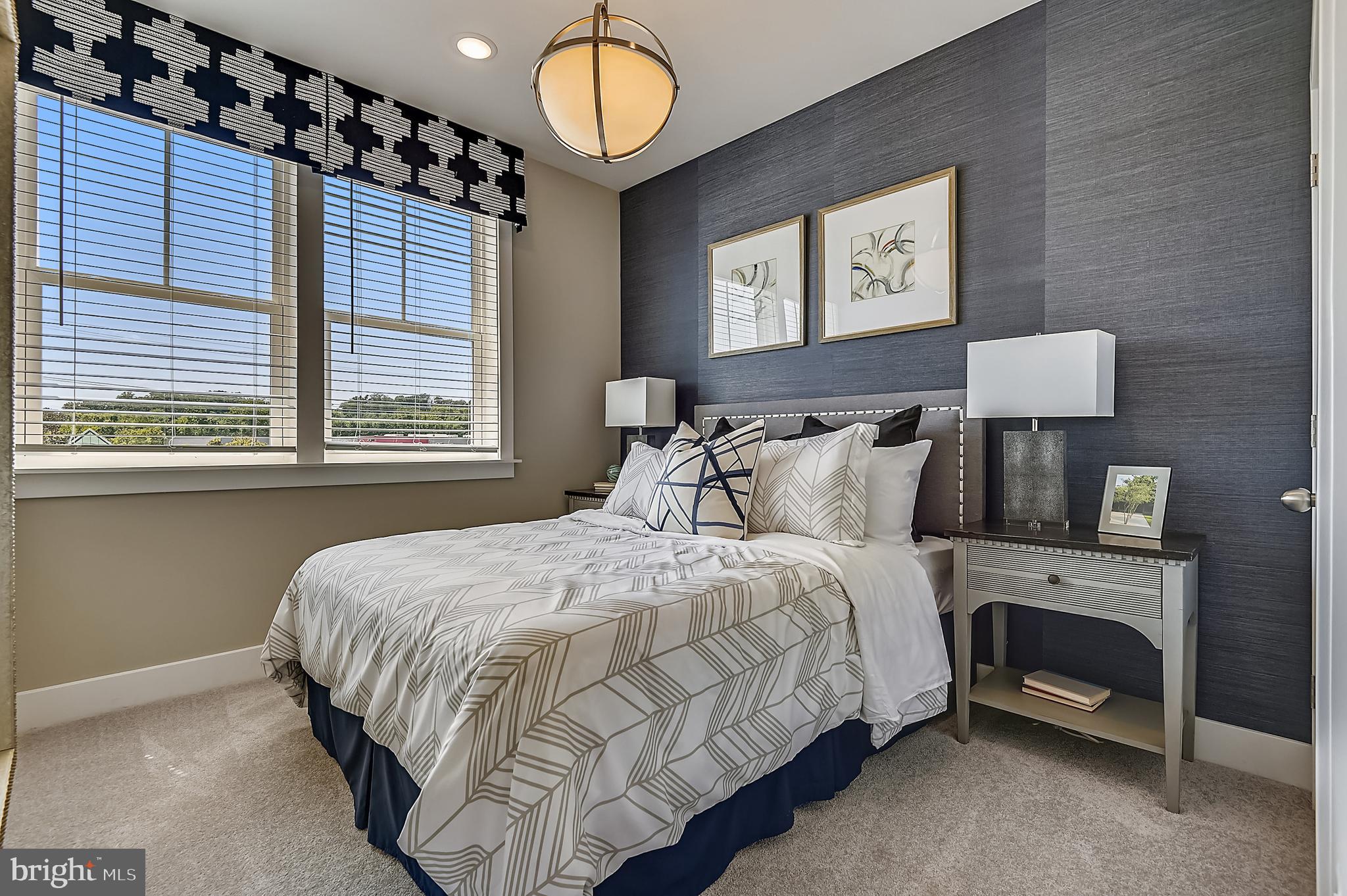 16606 Breezeway Alley Accokeek, MD 20607 - Photo 24 of 34 a bedroom with a bed and window
