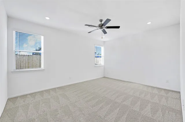 a view of a big room with windows