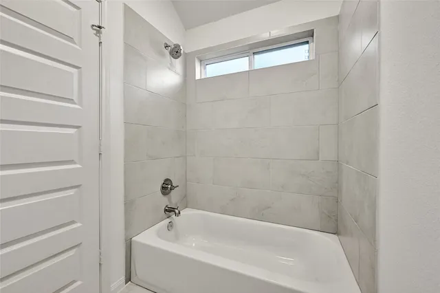 a bathroom with a bathtub