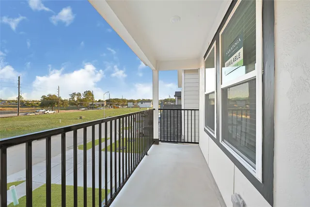 a view of a city from a balcony