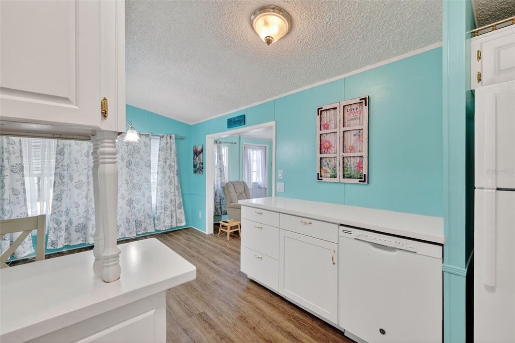 38237 Oriole Way Leesburg, FL 34788 - Photo 12 of 25 a hallway with a large window
