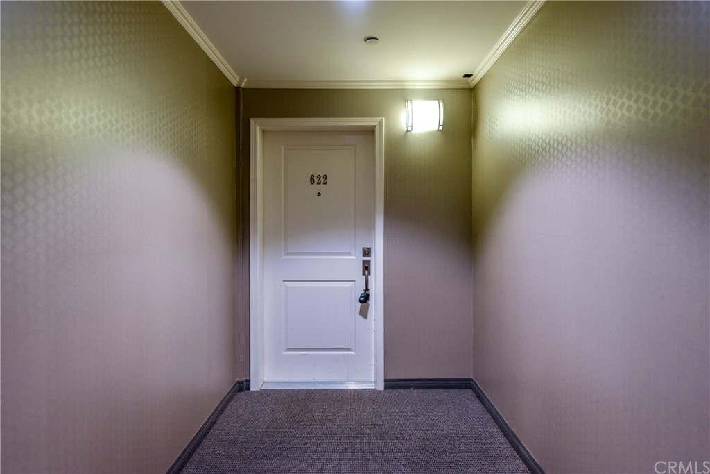 an empty room with an entryway