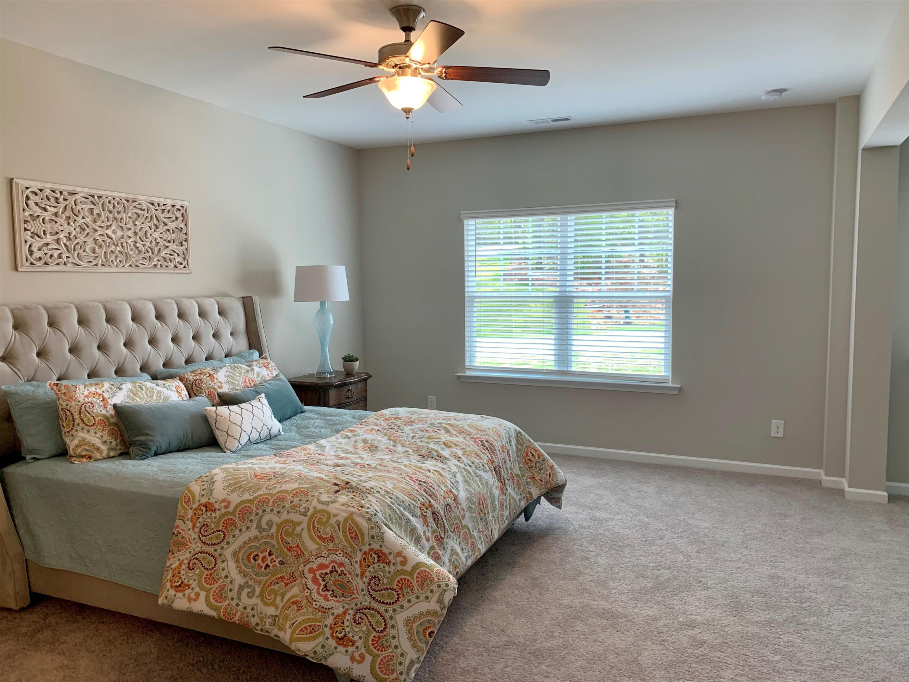 3901 Bluffwind Drive, Unit 129 Raleigh, NC 27603 - Photo 11 of 22 Primary Bedroom