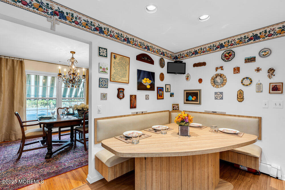 40 Brookside Lane Little Silver, NJ 07739 - Photo 13 of 43 a living room with stainless steel appliances furniture a rug and a table