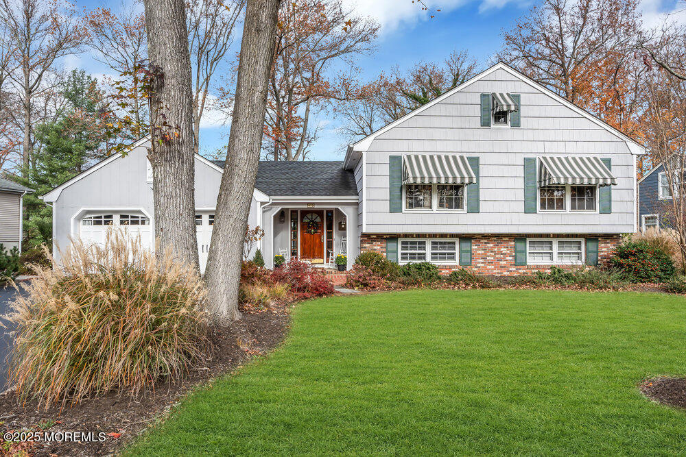 40 Brookside Lane Little Silver, NJ 07739 - Photo 2 of 43 a front view of house with yard and green space