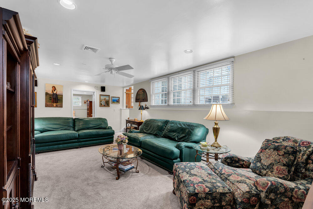 40 Brookside Lane Little Silver, NJ 07739 - Photo 24 of 43 a living room with furniture and a large window
