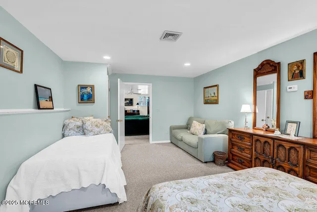 a bedroom with furniture and a couch