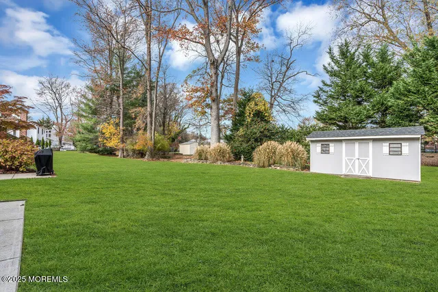 a view of a house with a big yard
