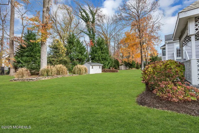 a view of a garden with a building