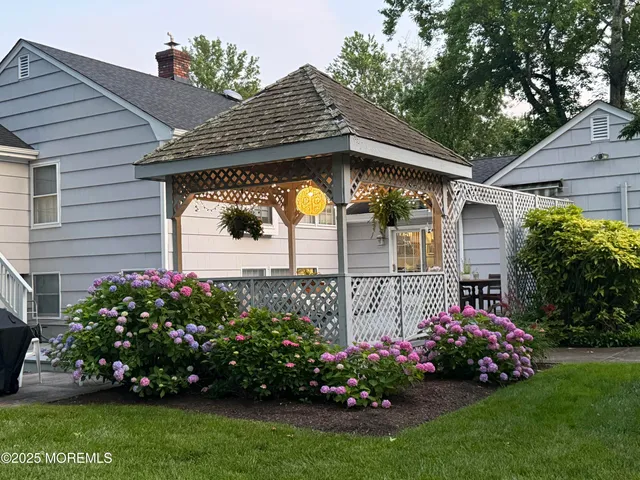 a view of a house with a garden