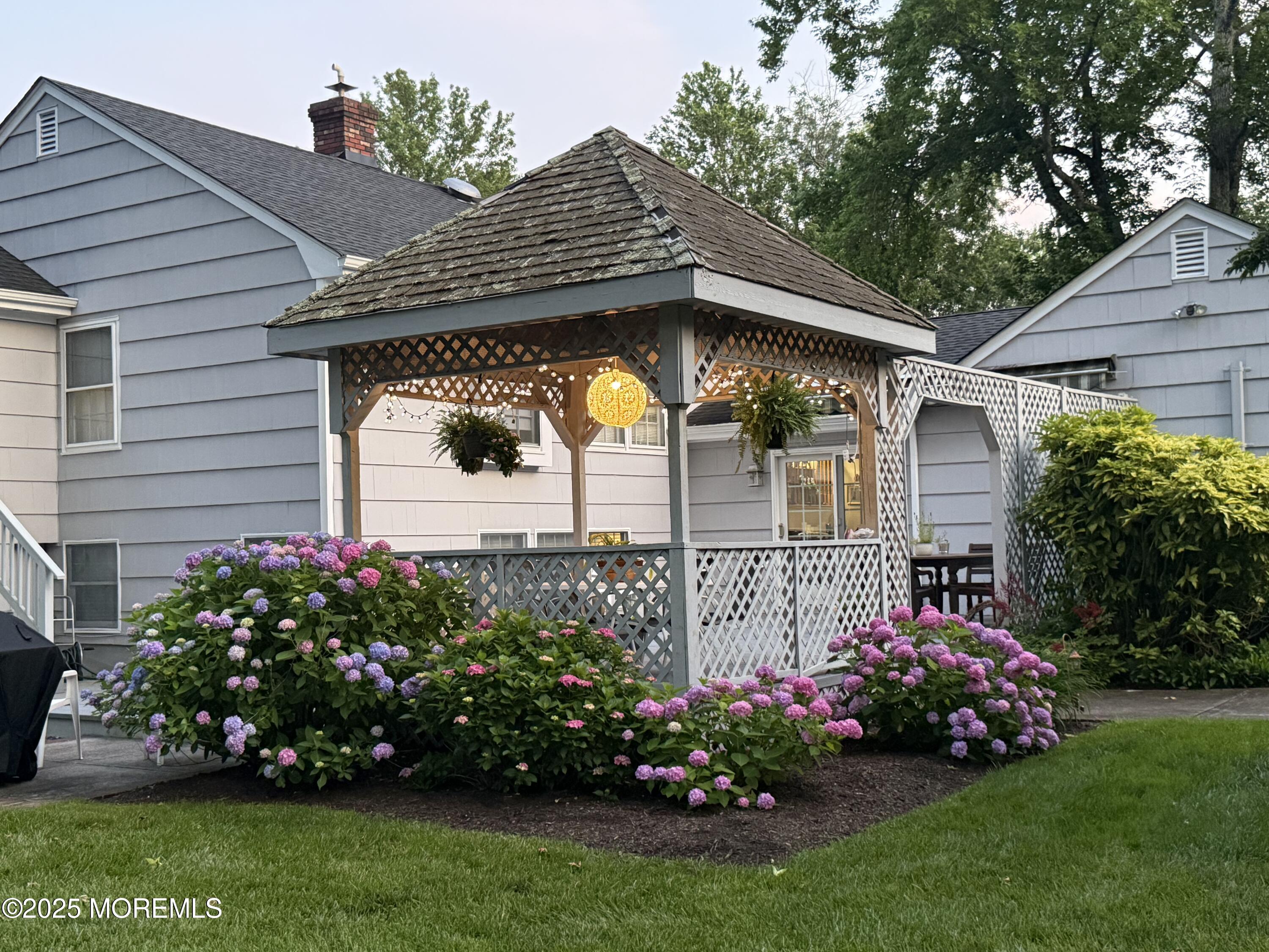 40 Brookside Lane Little Silver, NJ 07739 - Photo 42 of 43 a view of a house with a garden