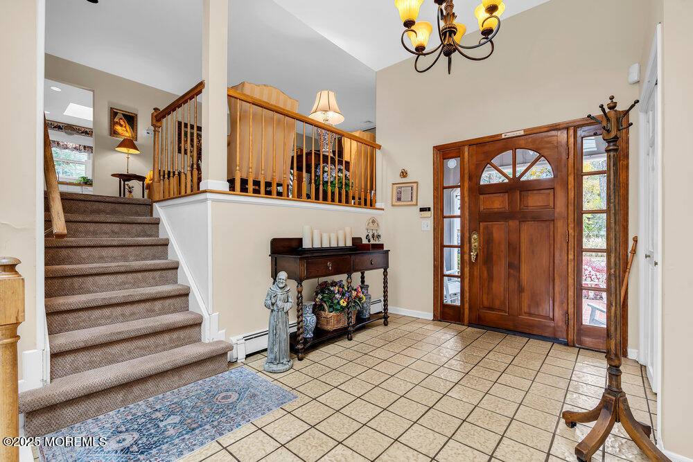 40 Brookside Lane Little Silver, NJ 07739 - Photo 6 of 43 a view of an entryway with a staircase