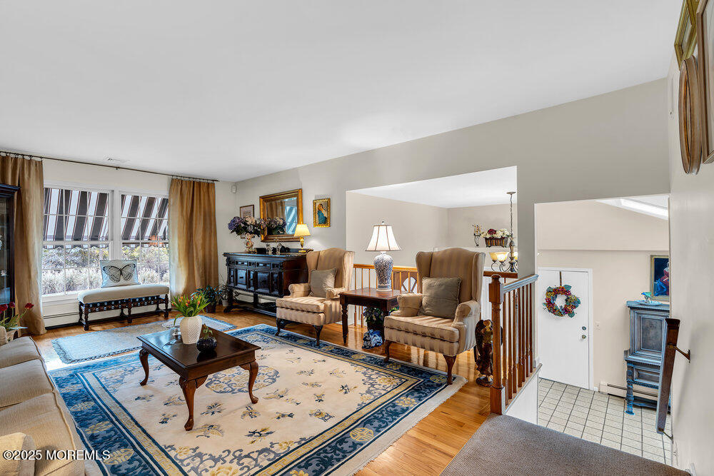 40 Brookside Lane Little Silver, NJ 07739 - Photo 7 of 43 a living room with furniture rug and a large window