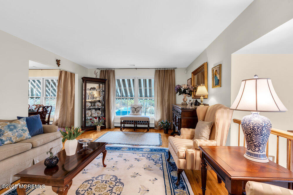 40 Brookside Lane Little Silver, NJ 07739 - Photo 8 of 43 a living room with furniture and a window