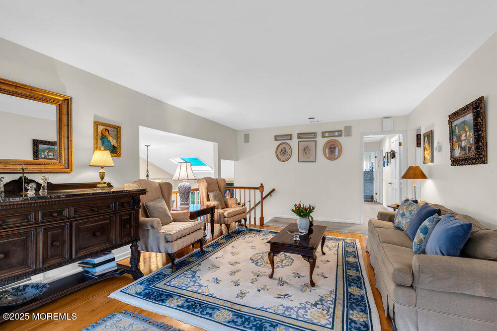 40 Brookside Lane Little Silver, NJ 07739 - Photo 9 of 43 a living room with furniture and a flat screen tv