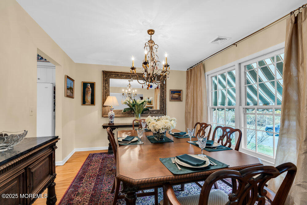 40 Brookside Lane Little Silver, NJ 07739 - Photo 10 of 43 a view of a dining room with furniture window and wooden floor