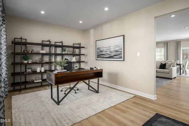 a view of a livingroom with furniture and window