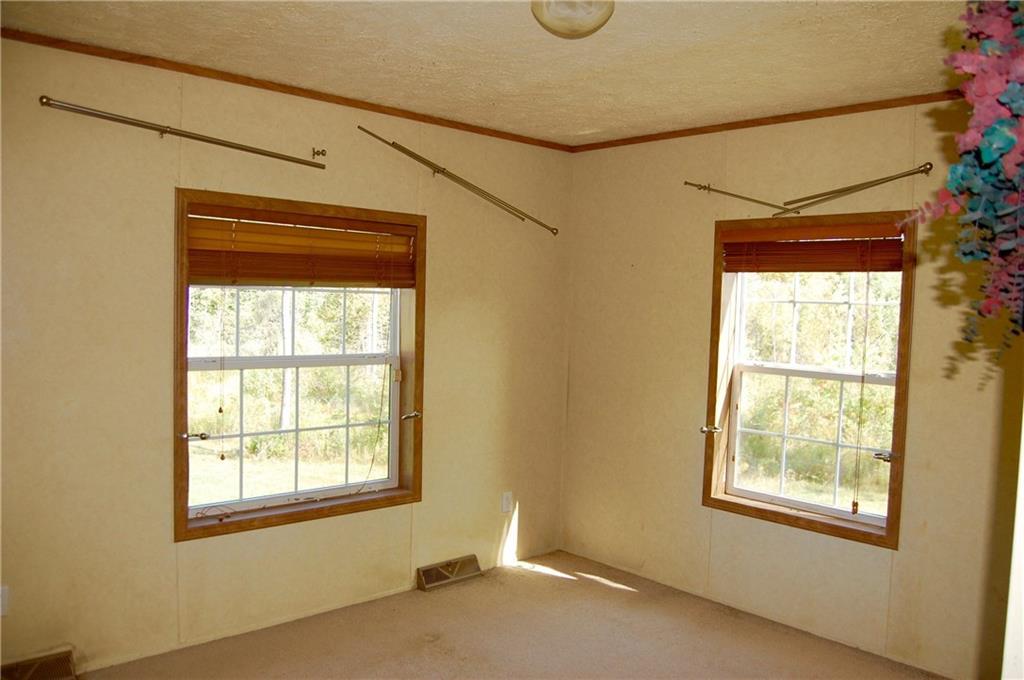 326 Fuller Corner Road Hartland, ME 04943 - Photo 16 of 35 Corner bedroom provides natural...