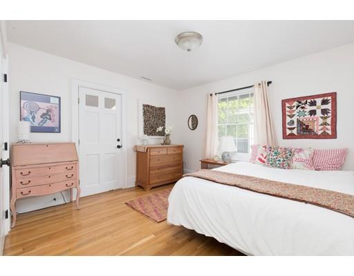 49 Grozier Road Cambridge, MA 02138 - Photo 12 of 22 a bedroom with a bed and a dresser