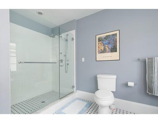 49 Grozier Road Cambridge, MA 02138 - Photo 17 of 22 a bathroom with a toilet and a shower