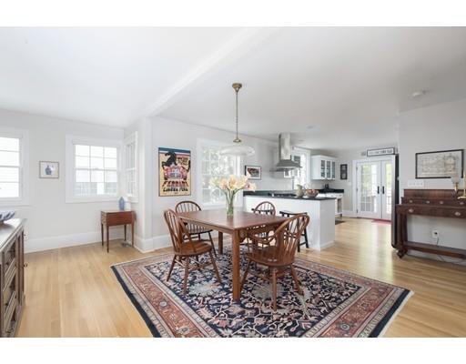 49 Grozier Road Cambridge, MA 02138 - Photo 4 of 22 a view of a dining room with furniture and wooden floor