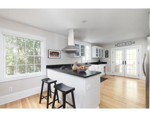 49 Grozier Road Cambridge, MA 02138 - Photo 6 of 22 a living room with furniture and a wooden floor