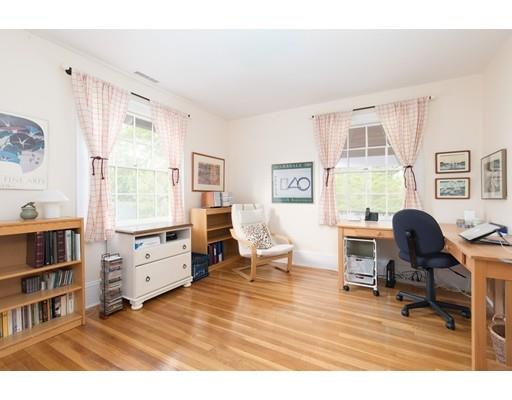 49 Grozier Road Cambridge, MA 02138 - Photo 9 of 22 a room with furniture window and a book shelf