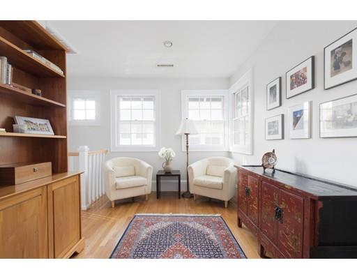 49 Grozier Road Cambridge, MA 02138 - Photo 10 of 22 a living room with furniture and a window
