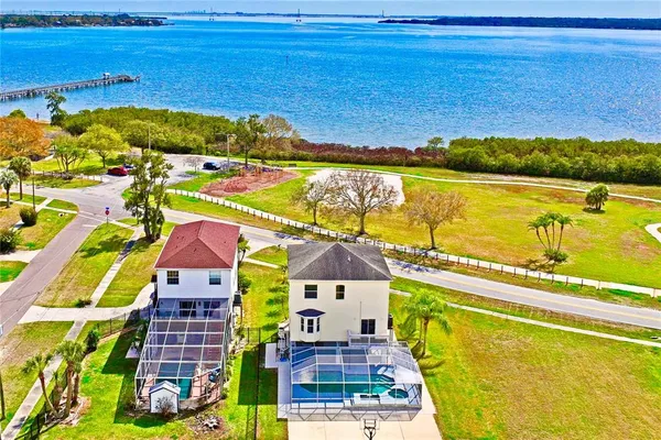 a view of a city with an ocean view