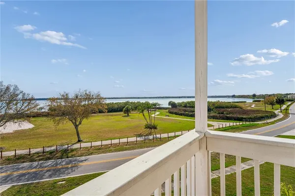 a view of a balcony with lake view