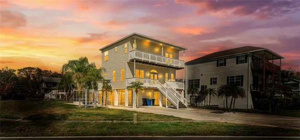 a view of a building with a yard