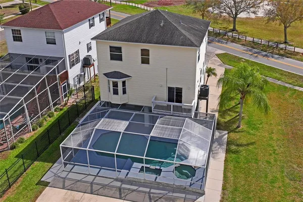 a view of swimming pool with an outdoor seating