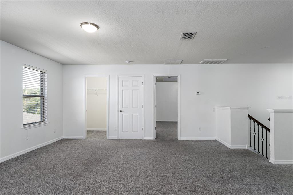 6026 100th Avenue East Parrish, FL 34219 - Photo 19 of 51 a view of an empty room and window