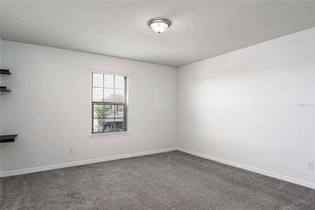 6026 100th Avenue East Parrish, FL 34219 - Photo 20 of 51 an empty room with a window