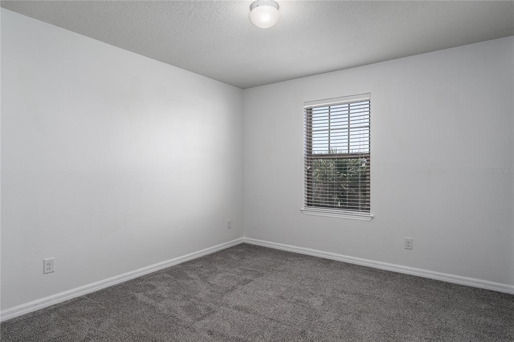 6026 100th Avenue East Parrish, FL 34219 - Photo 26 of 51 an empty room with a window
