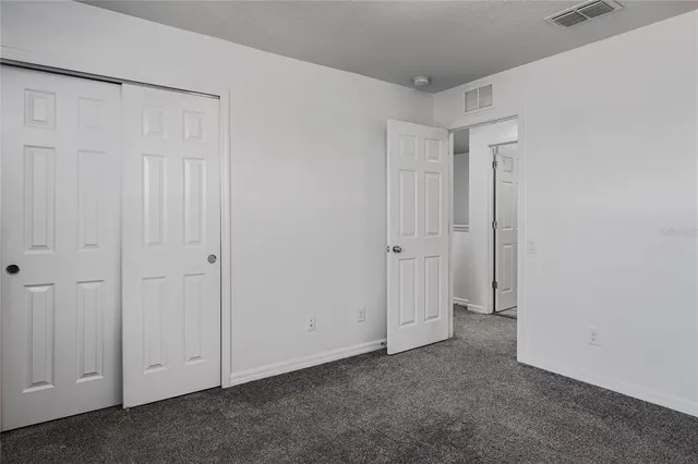 a aerial view of a house with a yard