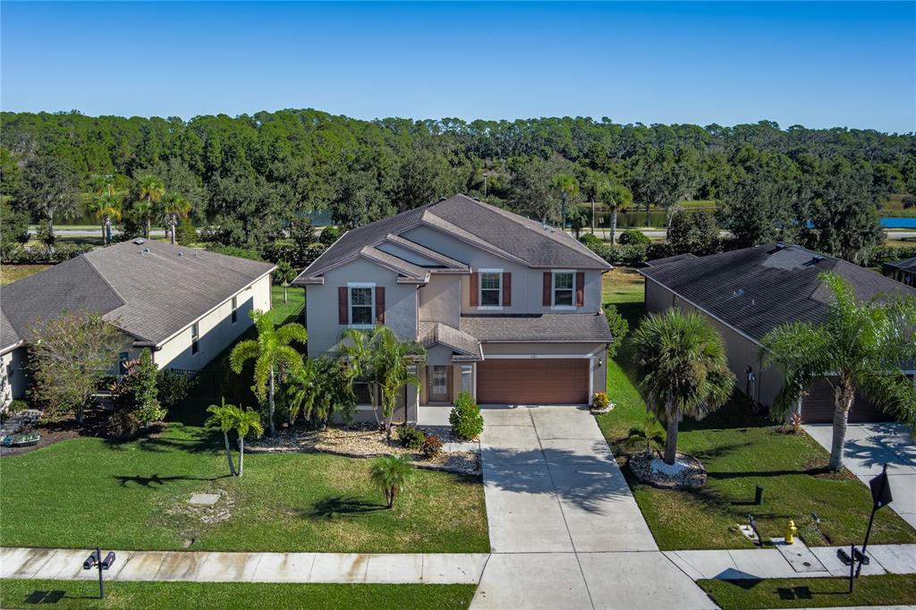 6026 100th Avenue East Parrish, FL 34219 - Photo 35 of 51 a aerial view of a house with a yard