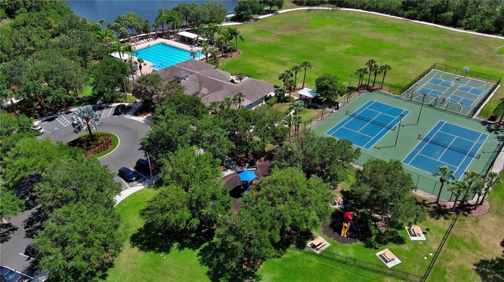 6026 100th Avenue East Parrish, FL 34219 - Photo 50 of 51 an aerial view of a house with garden space and street view
