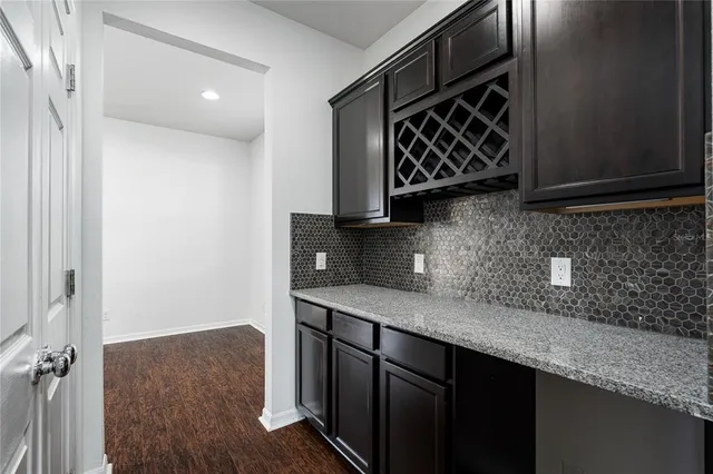 a kitchen with a sink and a stove