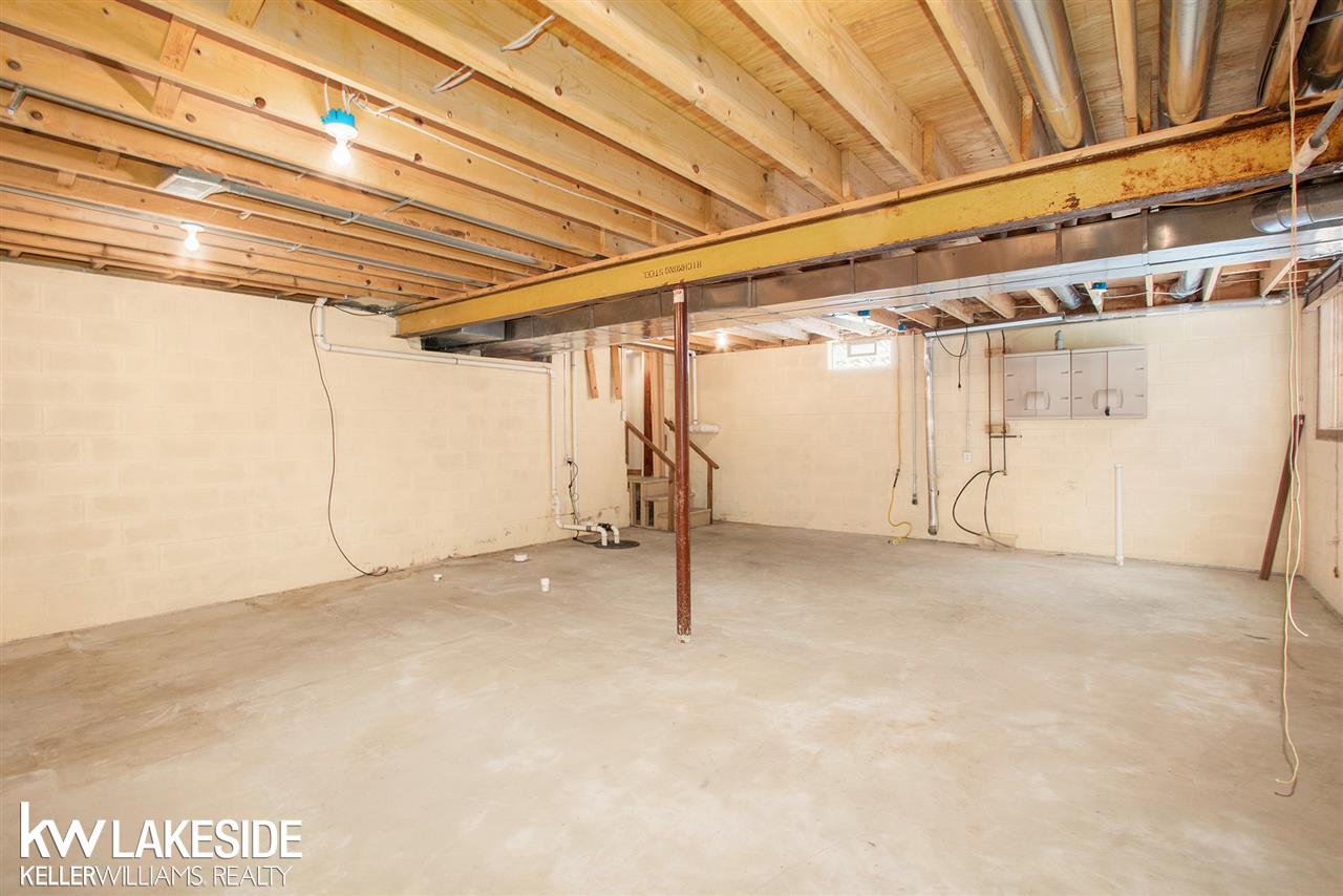 34344 Armada Ridge Road Richmond, MI 48062 - Photo 36 of 36 Another view of the newer part of the basement. It also has an egress window!