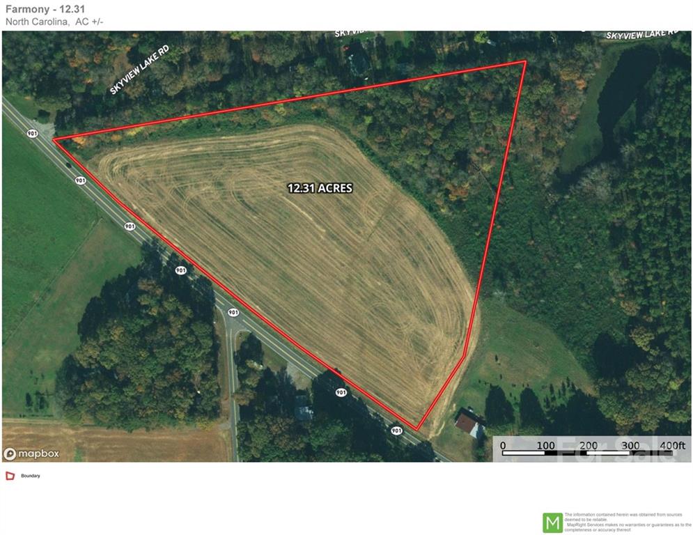 178 Skyview Lake Road Harmony, NC 28634 - Photo 8 of 13 a black and white photo of a book