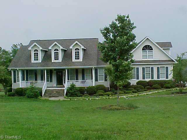 6380 Gumwood Road Oak Ridge, NC 27310 - Photo 1 of 8 Exterior Front.