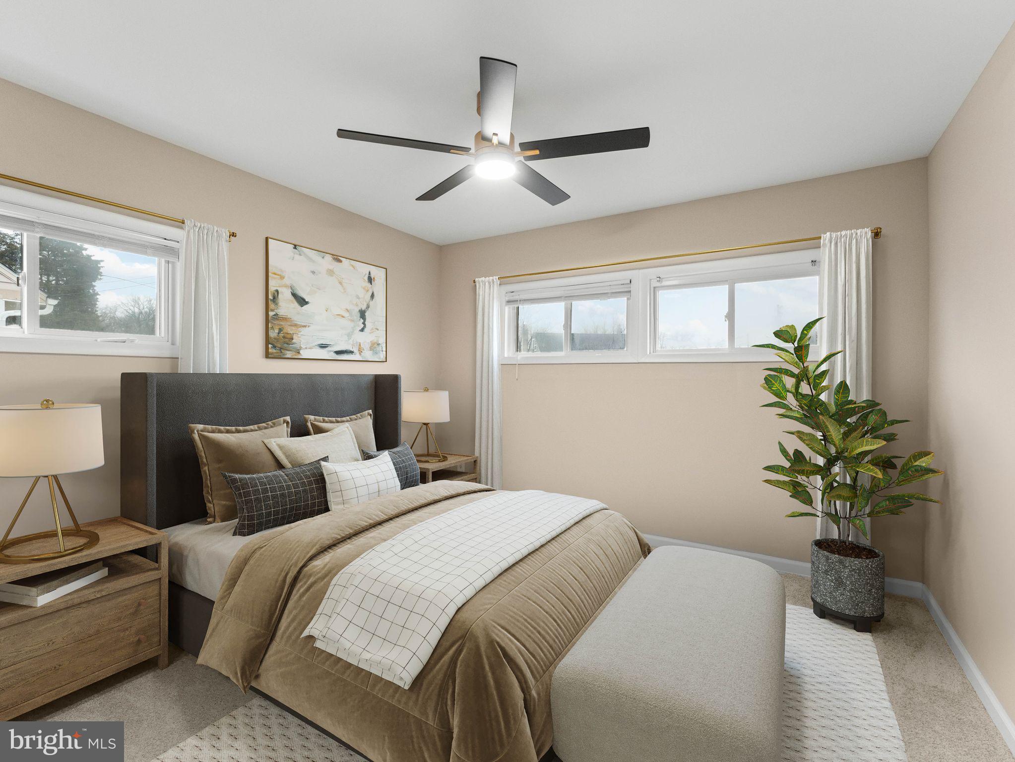 148 Lincoln Road Wenonah, NJ 08090 - Photo 18 of 40 a bedroom with a bed and a potted plant