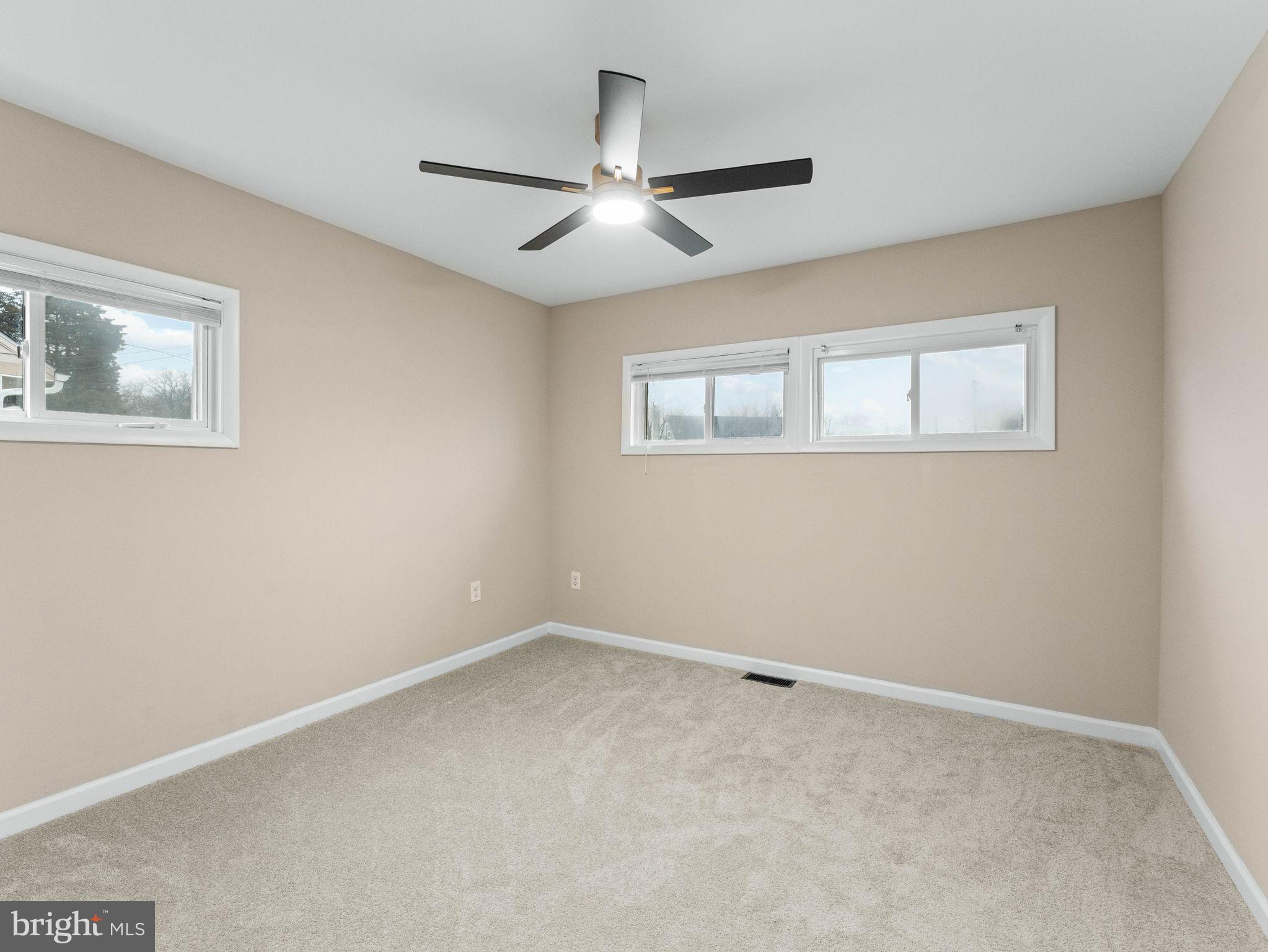 148 Lincoln Road Wenonah, NJ 08090 - Photo 19 of 40 a view of an empty room with a window