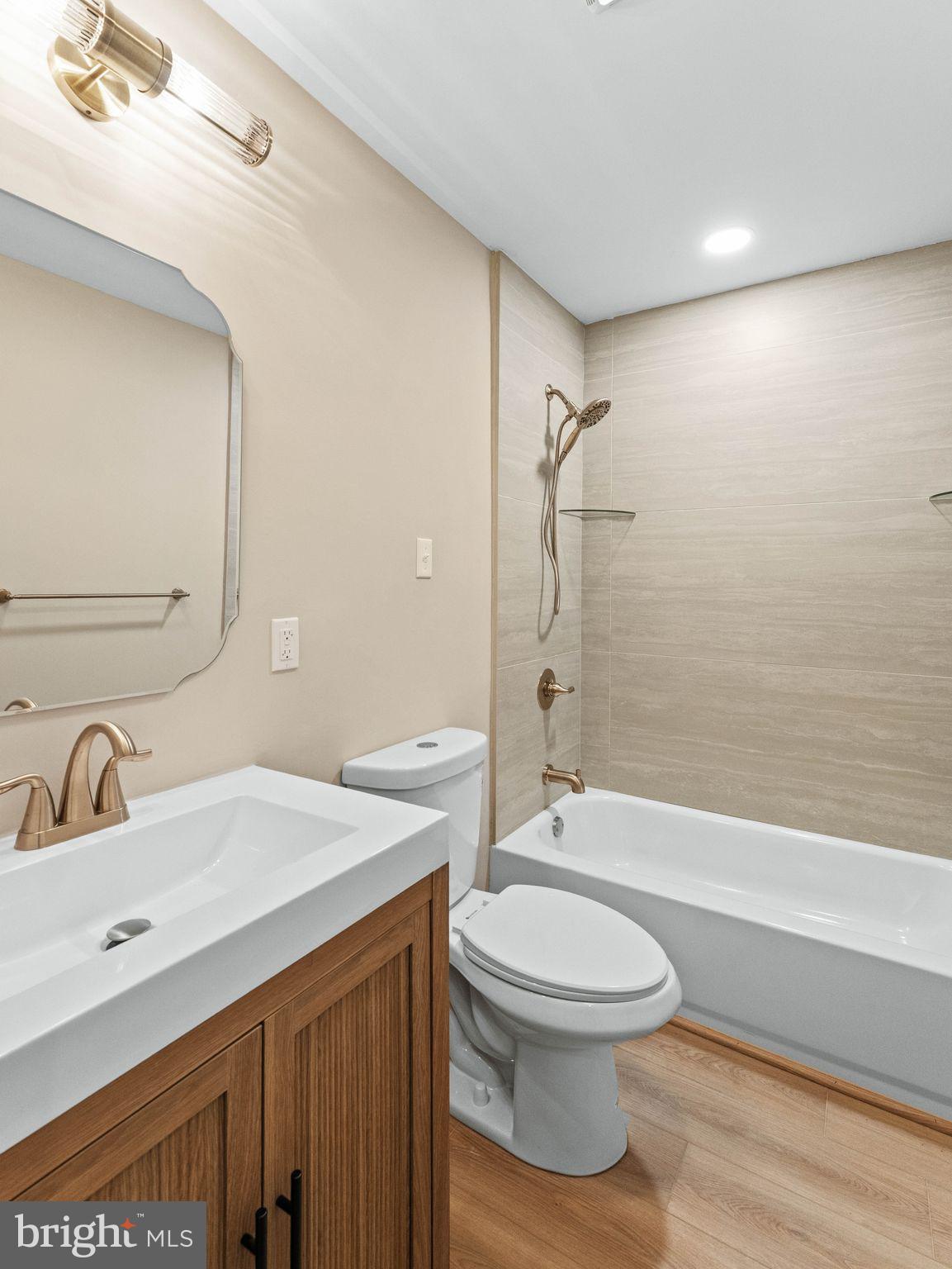 148 Lincoln Road Wenonah, NJ 08090 - Photo 21 of 40 a bathroom with a sink a toilet and a bathtub