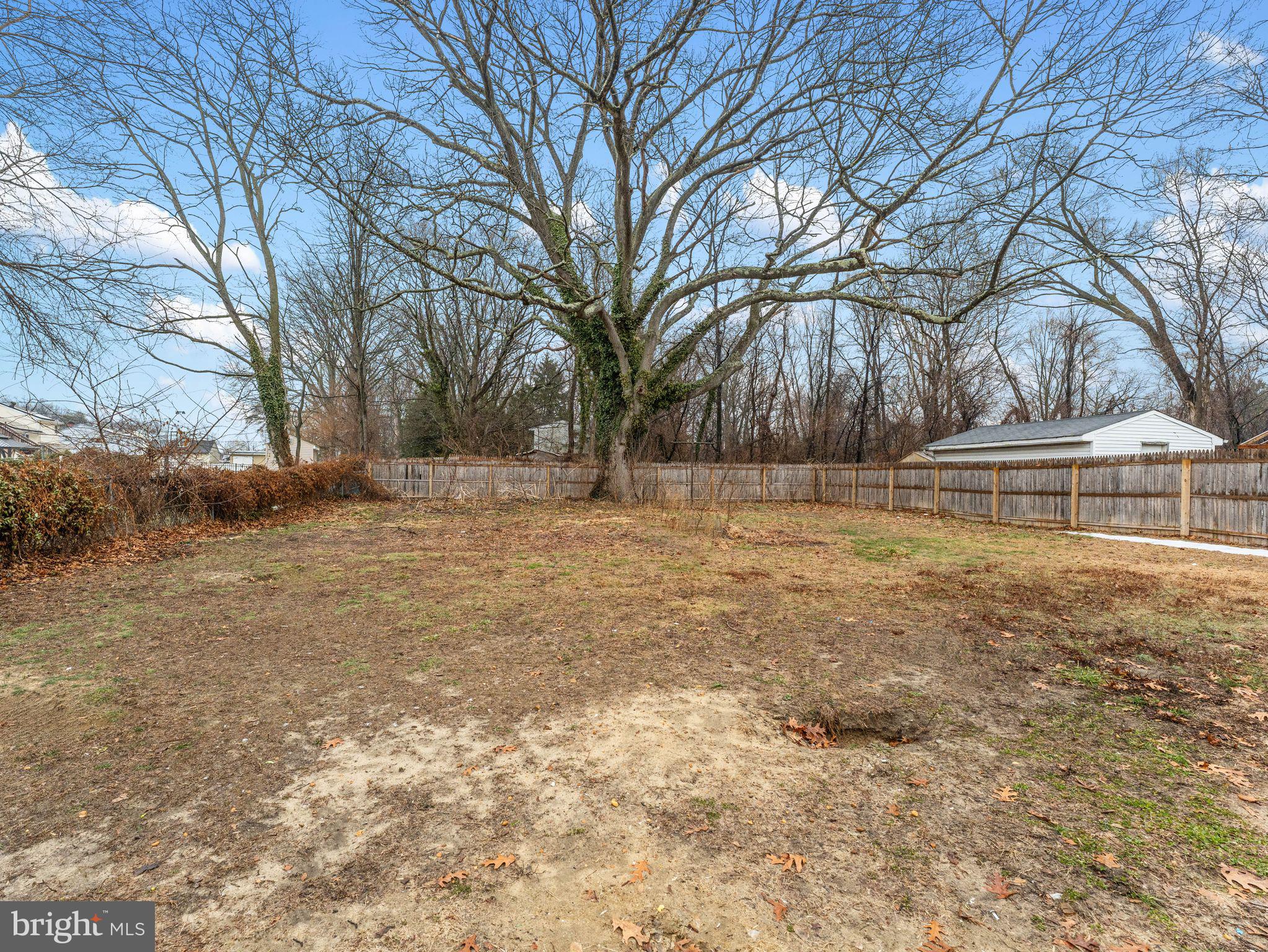 148 Lincoln Road Wenonah, NJ 08090 - Photo 28 of 40 a backyard of a house with lots of green space