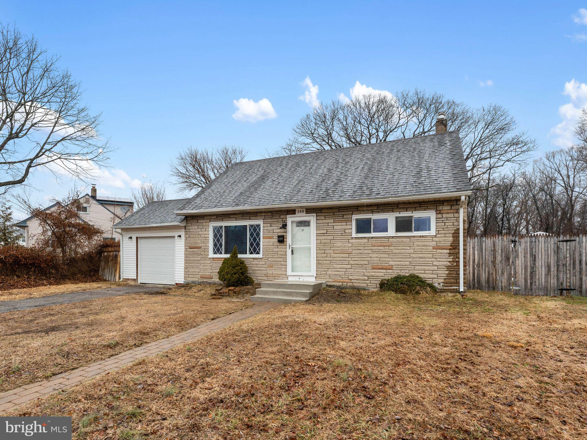 148 Lincoln Road Wenonah, NJ 08090 - Photo 3 of 40 a view of a house with a yard