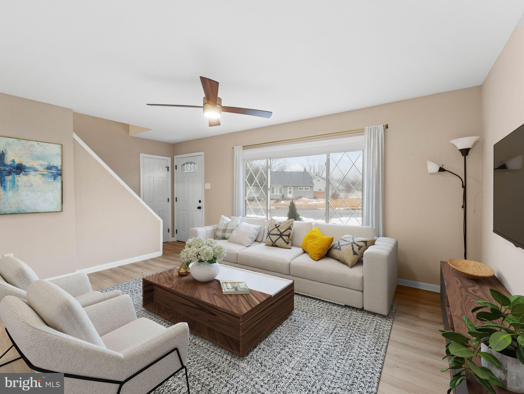 148 Lincoln Road Wenonah, NJ 08090 - Photo 6 of 40 a living room with furniture and a large window