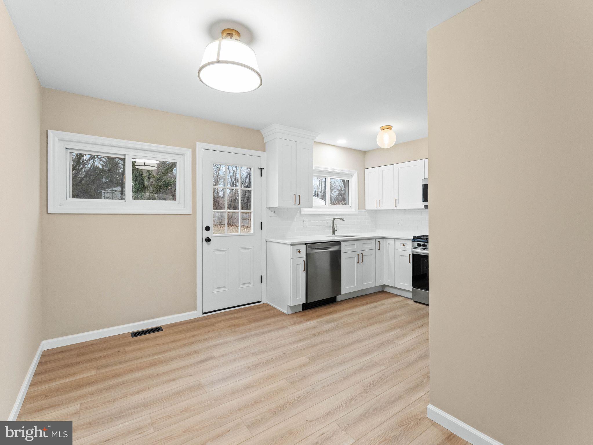 148 Lincoln Road Wenonah, NJ 08090 - Photo 10 of 40 a view of kitchen with wooden floor